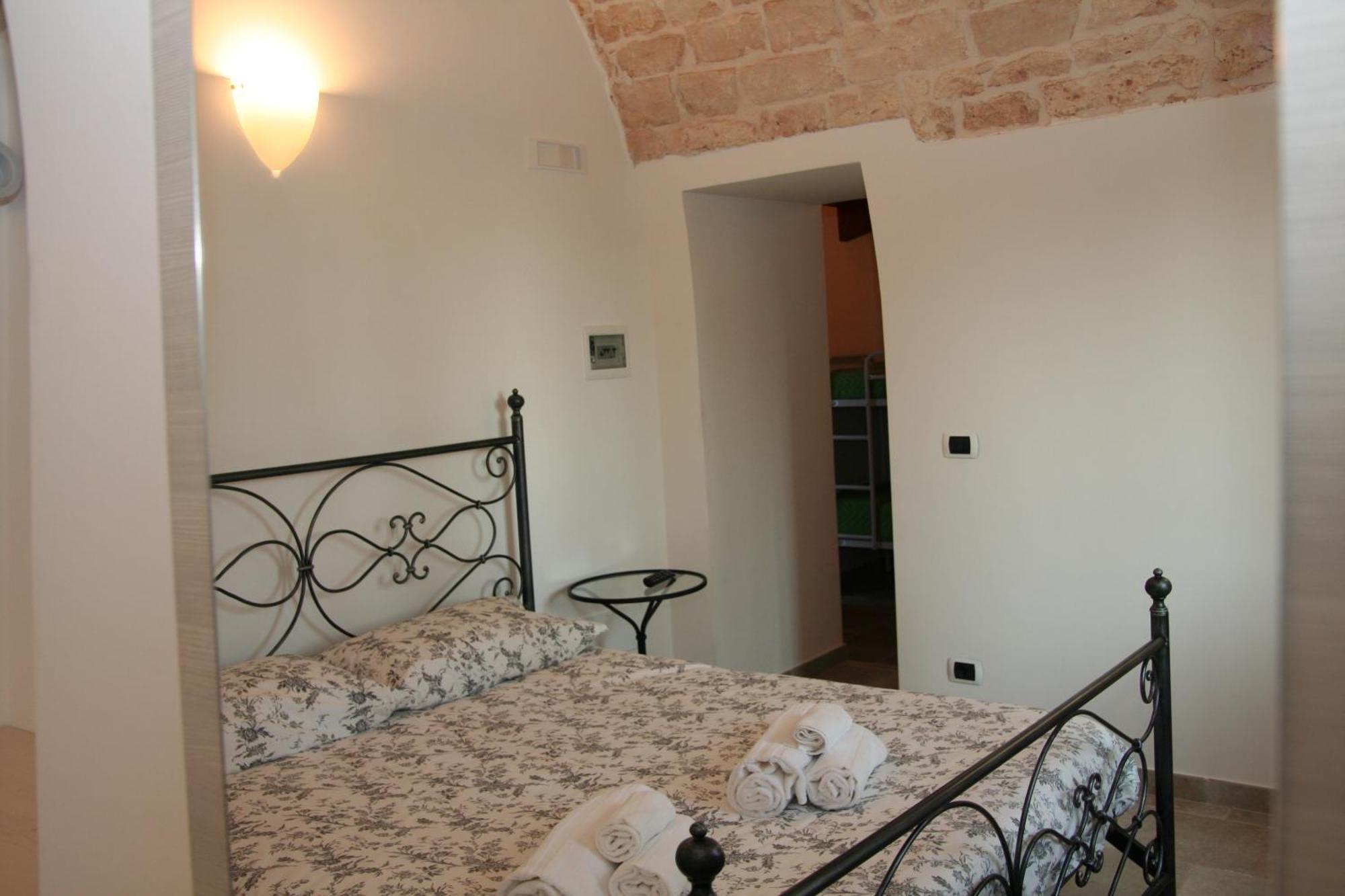 Bed and Breakfast La Dimora Gigante Castellana Grotte Habitación foto