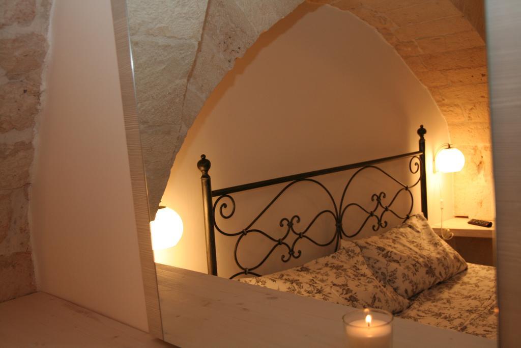Bed and Breakfast La Dimora Gigante Castellana Grotte Habitación foto